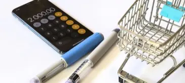 A Mounjaro injection pen with a price comparison, showing the real cost of cheap Mounjaro in the UK